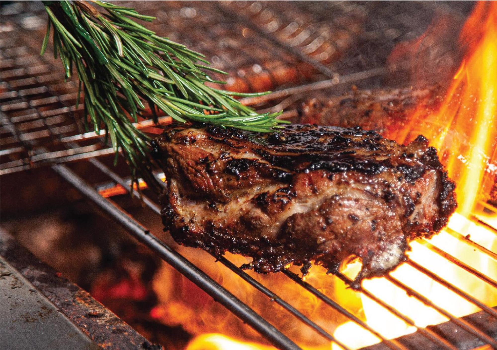 Jumeirah Messilah Beach Kuwait Kuwait City Esterno foto A steak being grilled