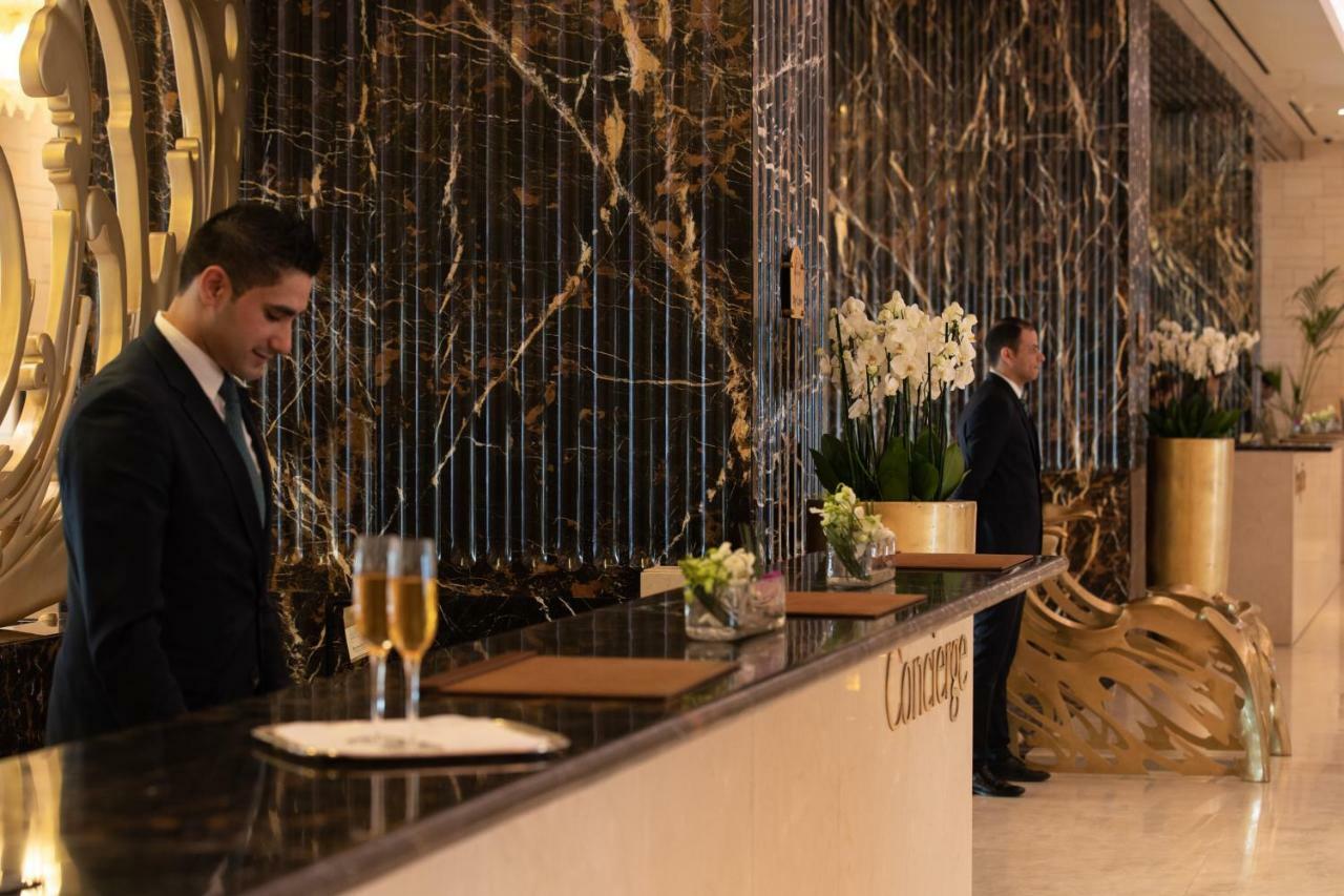 Jumeirah Messilah Beach Kuwait Kuwait City Esterno foto Concierge at the Four Seasons Hotel, London